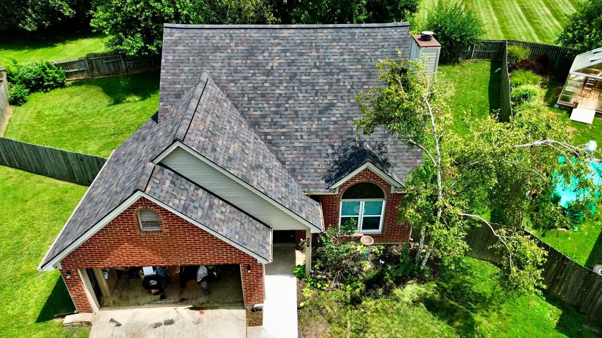 New Roof — Dimensional Shingles on Brick Home — Rook Roofing & Restoration Ashland KY